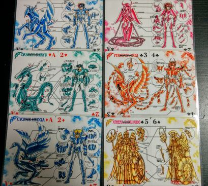 Amazon.co.jp: 聖闘士星矢 聖衣分解装着図トランプ 創刊50周年