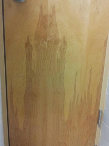 a-batman-ghost-on-the-mens-room-wall.jpg
