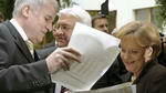 konjunktur-merkel-steinmeier-seehofer-11245600-465x262.jpg