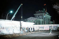 300px-Crane_removed_part_of_Wall_Brandenburg_Gate.jpg