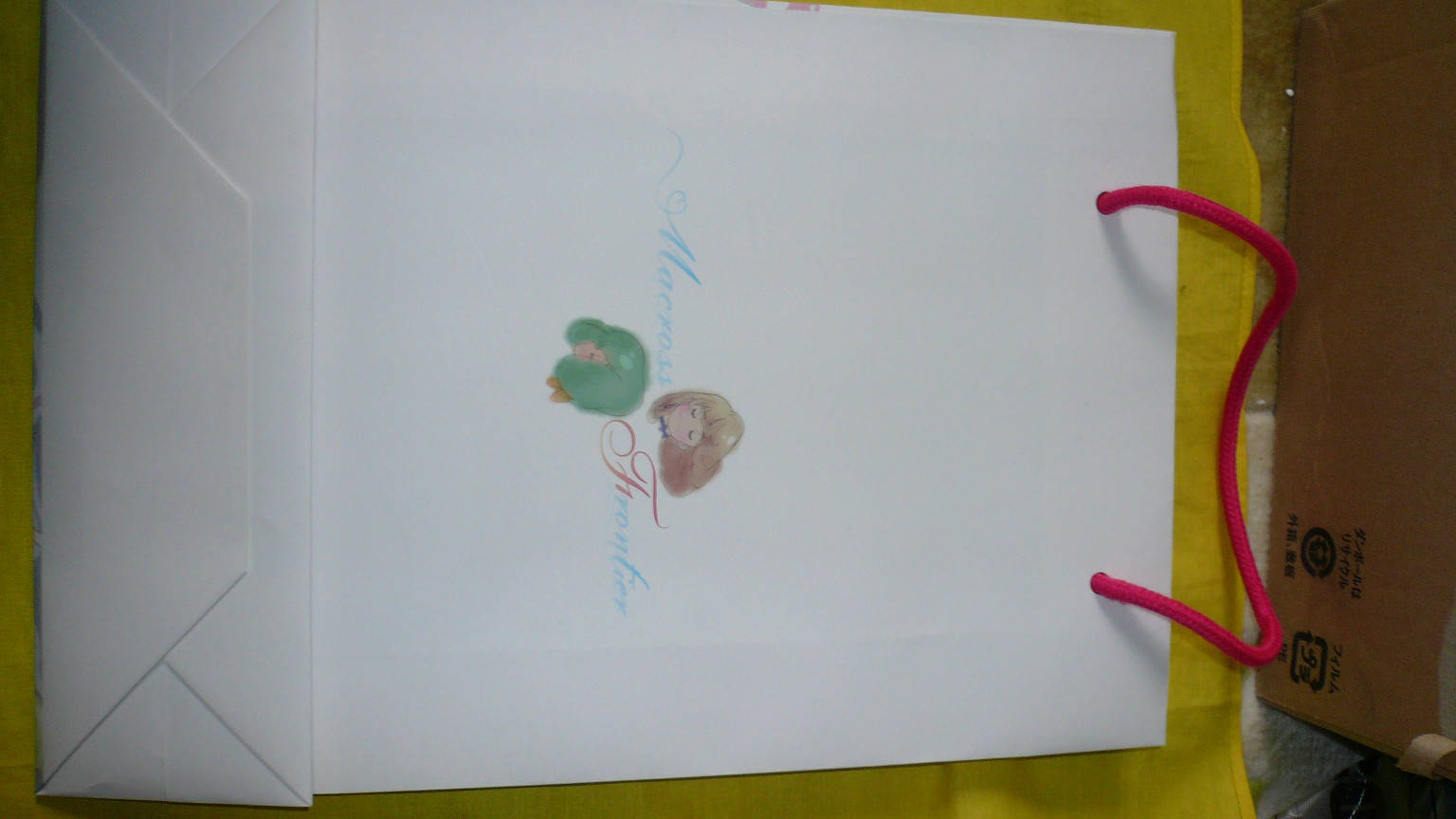 〇秘にゃんクレッとFile3紙袋裏