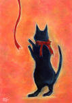 黒猫と赤いリボン