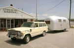 1970_jeep_wagoneer_with_airstreem.jpg