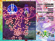 第2スペルは下方から大量の弾幕が迫る　弾速は遅いので季節開放で粘れば呑まれる前に突破できる